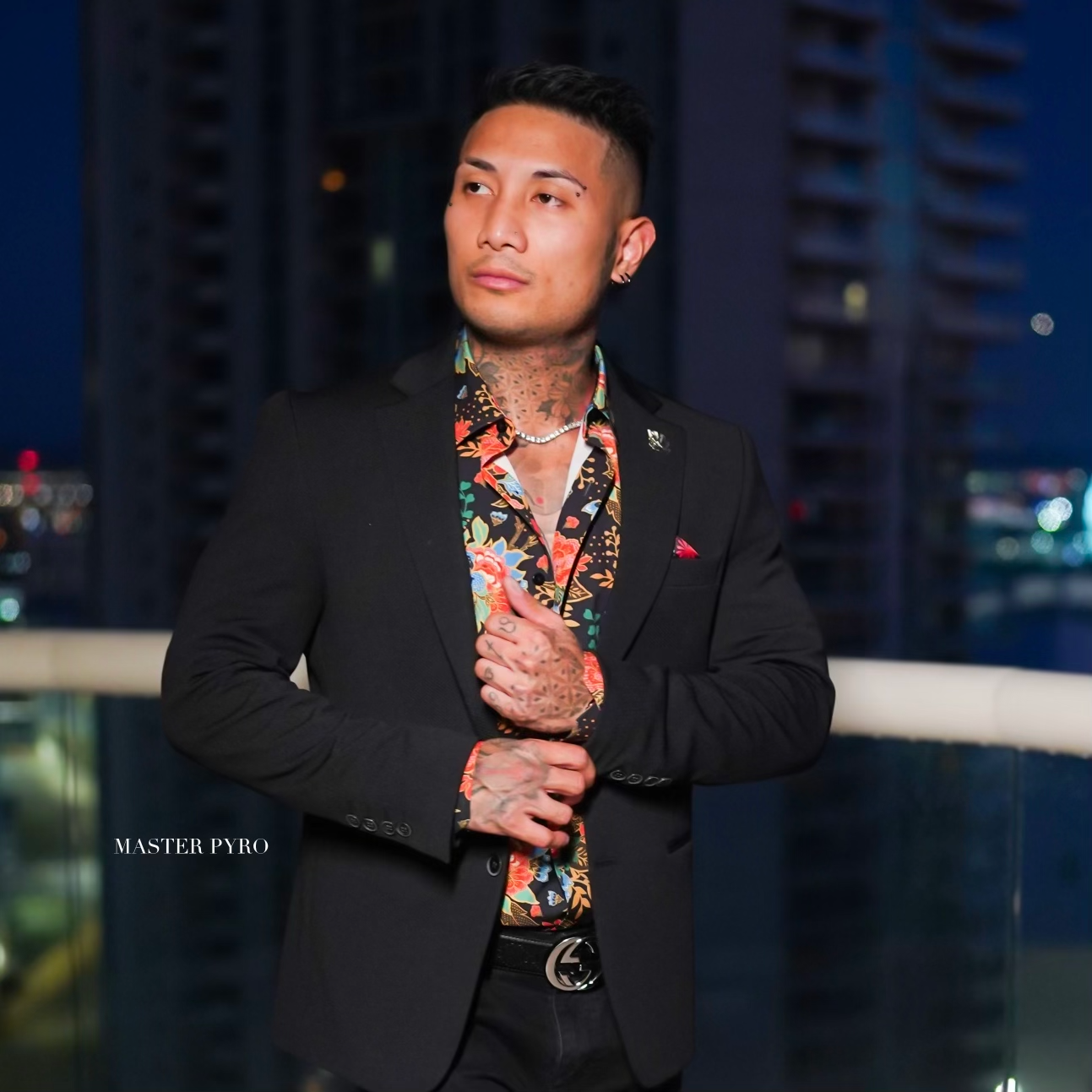Eros, founder of Eros Inner Circle and dating coach for men, on a city rooftop at night